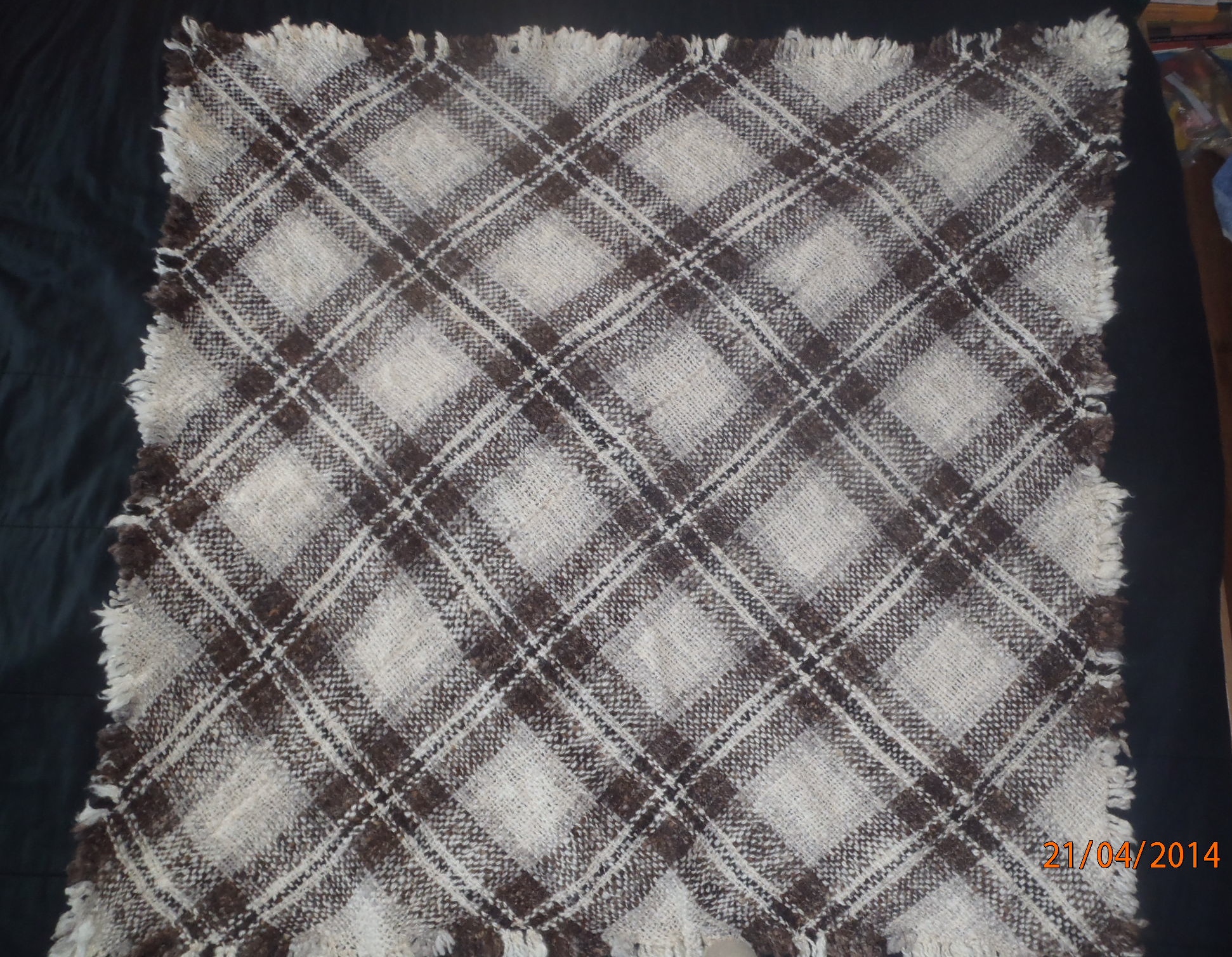 Hand woven, wool blanket.