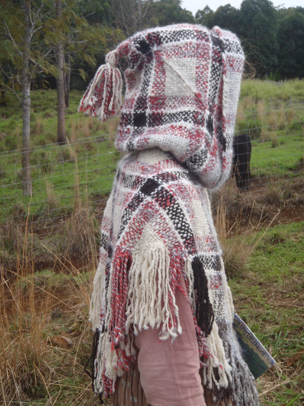 Red hooded shawl.